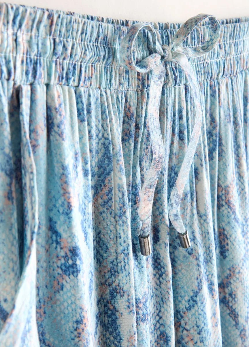Charlie Paige Python Print Scooped Hem Skirt